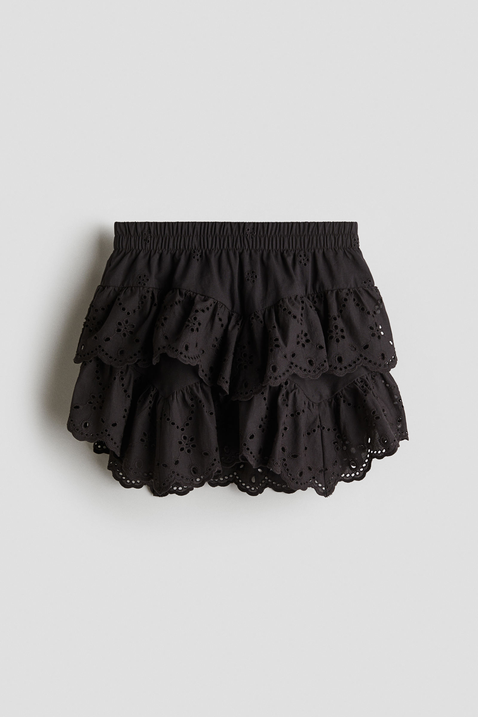 Falda de algodón con broderie inglés a $9.495